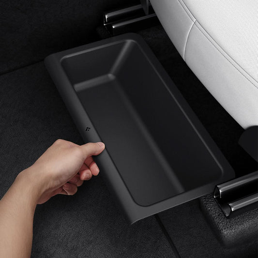 ACP10798 - Model Y Juniper (2025+) 2PK Underseat Organizer Box | TO222J showing a hand installing it inside of car