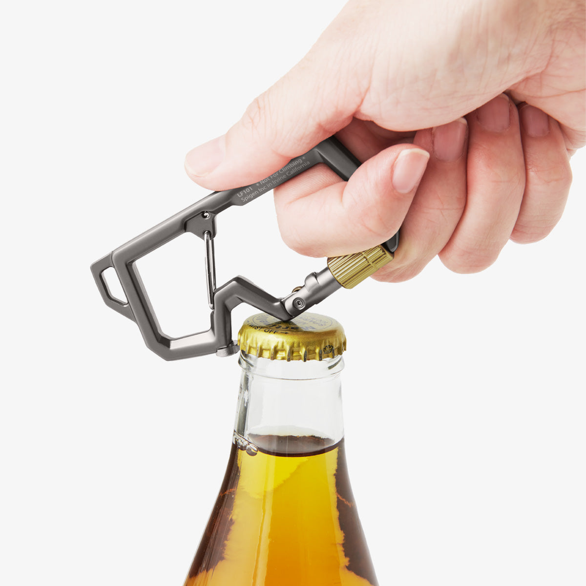 AHP08894 - Carabiner | LF101 in black showing a bottle with part of the carabiner being used as a bottle opener