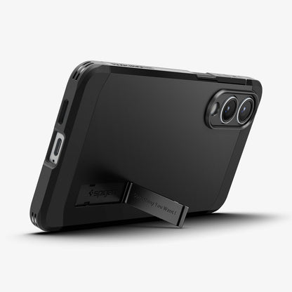 ACS09422 - Galaxy S25 Edge Case Tough Armor AI (MagFit) in Black showing the back, partial bottom, propped up with the built-in kickstand in landscape mode