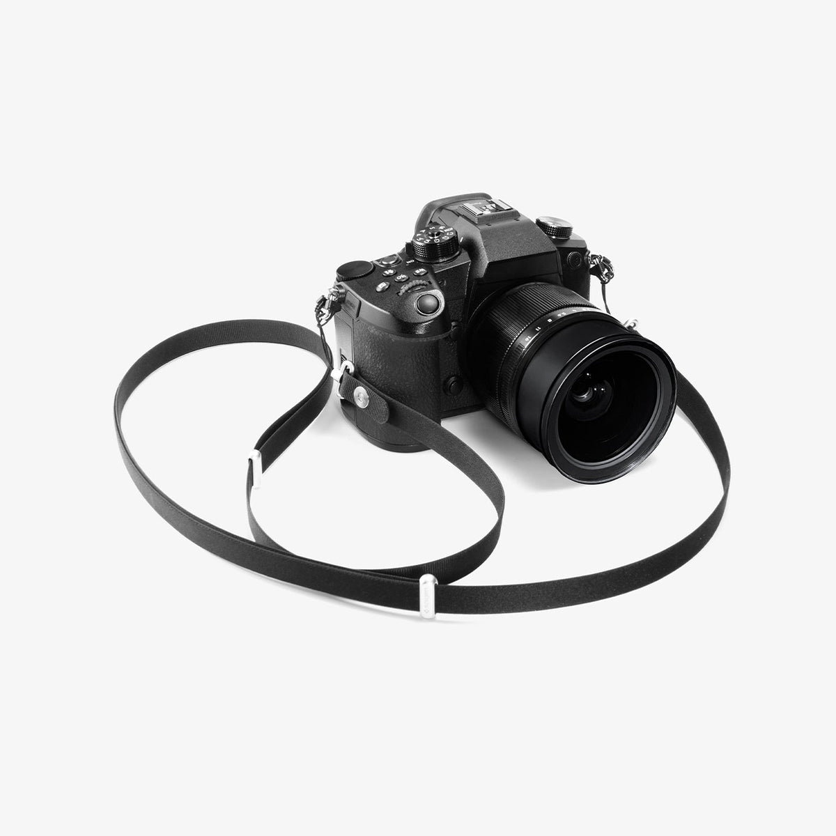 AFA10614 - Spigen Universal Lanyard Strap attached to camera for neck carry use