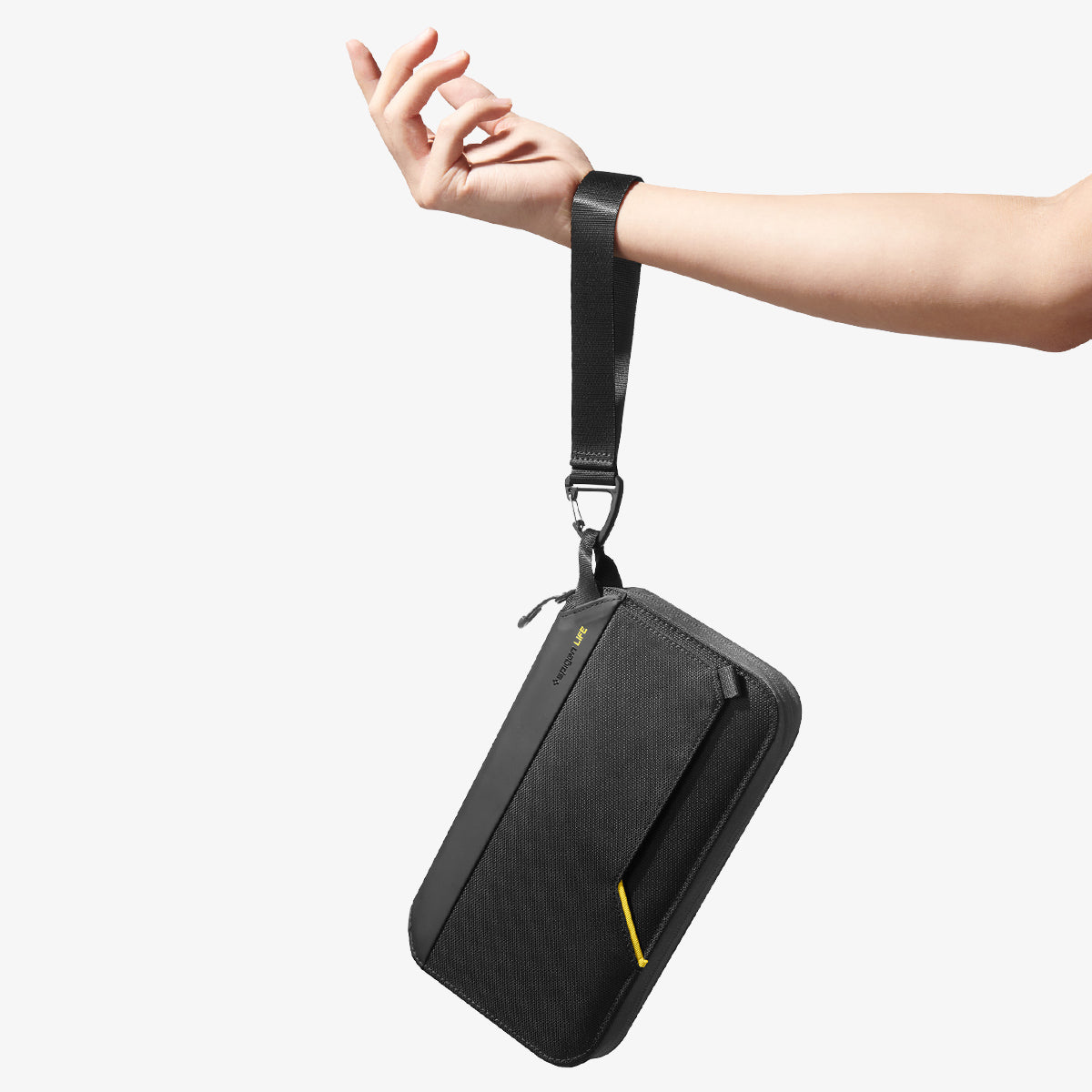 AFA07574 - Klasden Passport Organizer KD500 in Black showing the front while hanging on a person's wrist