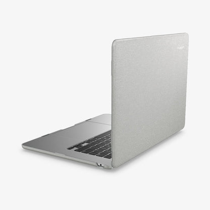 ACS10975 - MacBook Air 15-inch in Heather Gray showing the top and side with laptop slightly open and charging cable next to port