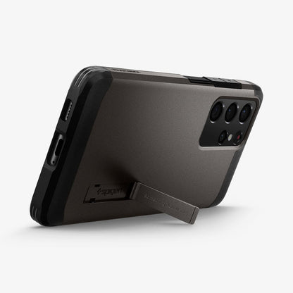 ACS02355 - Galaxy S21 Ultra Tough Armor Case in gunmetal showing the back with device propped up by built in kickstand