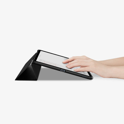 ACS03007 - Galaxy Tab S7 FE Case Rugged Armor Pro in black showing hands typing on screen with device propped up by built in kickstand