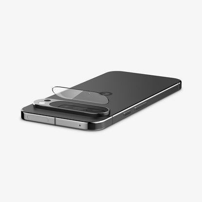 AGL08444 - Pixel 9 Pro Case Optik EZ Fit Lens Protector in Crystal Clear showing the lens protector partially hovering in front of the camera lens