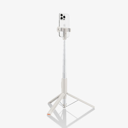 AMP09337 - Tripod Selfie Stick S541W in Dune Beige showing the back and partial side of the device attached to a retracted tripod showing side