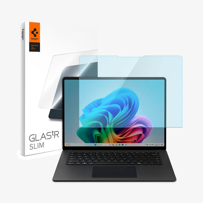 AGL08633 - Microsoft Surface Laptop 15-inch (2024) Glas.tR SLIM showing the screen protector hovering in front of the device and the packaging