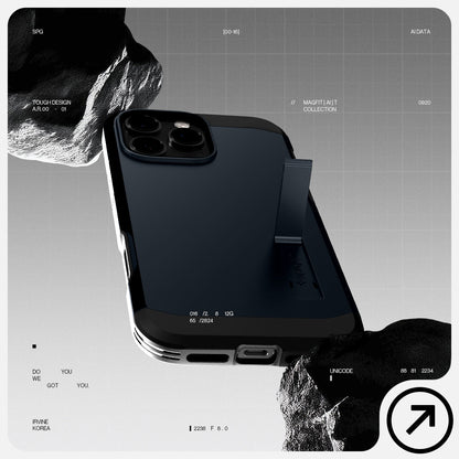 ACS08511 - iPhone 16 Pro Case Tough Armor T AI (MagFit + Camera Control) in Metal Slate showing the back, partial side and bottom in between rocks