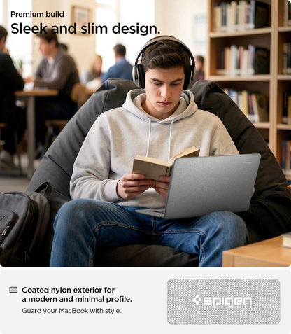 ACS10975 - MacBook Air 15-inch in Heather Gray showing lifestyle shot of sleek and slim design; highlights coated nylon exterior for a modern and minimal profile