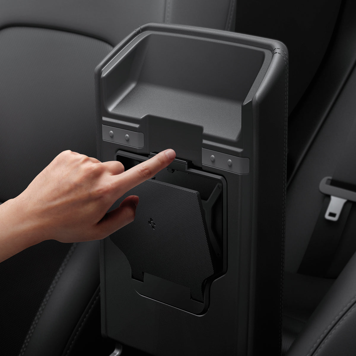 ACP07408 - Tesla Model Y 2025 Refresh & 3 Highland - Center Console Hidden Storage Box showing a hand pushing button to reveal storage box