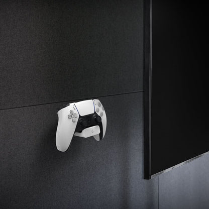 AMP06397 - PlayStation 5 Controller Mount | VG300 in White showing the front and partial side attached to a mount installed on a wall